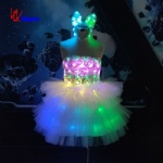 A glowing skirt with a bow tiara